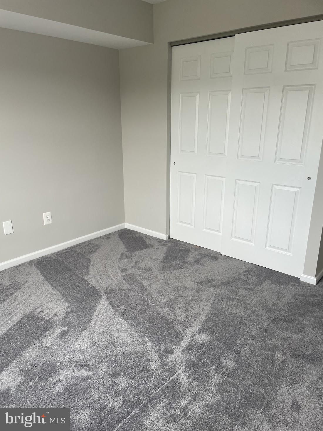 8343 Montgomery Run Road Ellicott City, MD 21043 - Photo 32 of 36 Spacious room with fresh carpet.