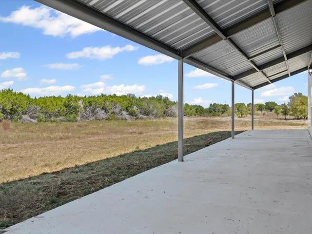 a view of a road with an ocean view