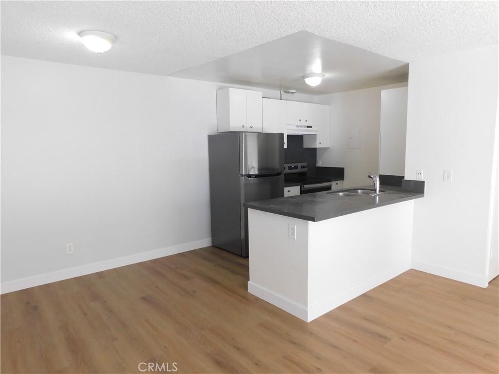 2521 West Sunflower Avenue, Unit R1 Santa Ana, CA 92704 - Photo 1 of 38 New Flooring & Appliances