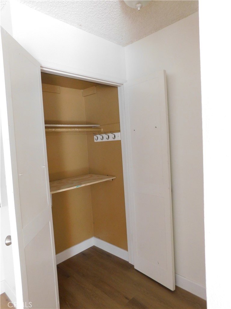 2521 West Sunflower Avenue, Unit R1 Santa Ana, CA 92704 - Photo 11 of 38 Entry Closet with additional storage
