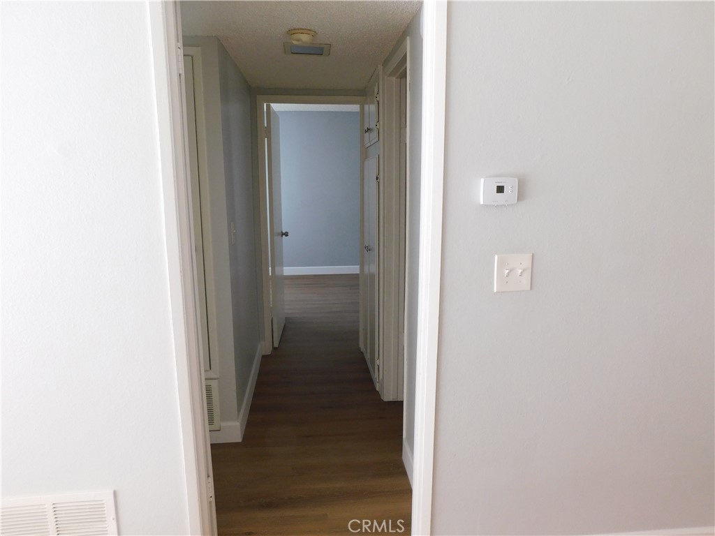 2521 West Sunflower Avenue, Unit R1 Santa Ana, CA 92704 - Photo 12 of 38 Hall leading to 2 bedrooms and 2 bathrooms