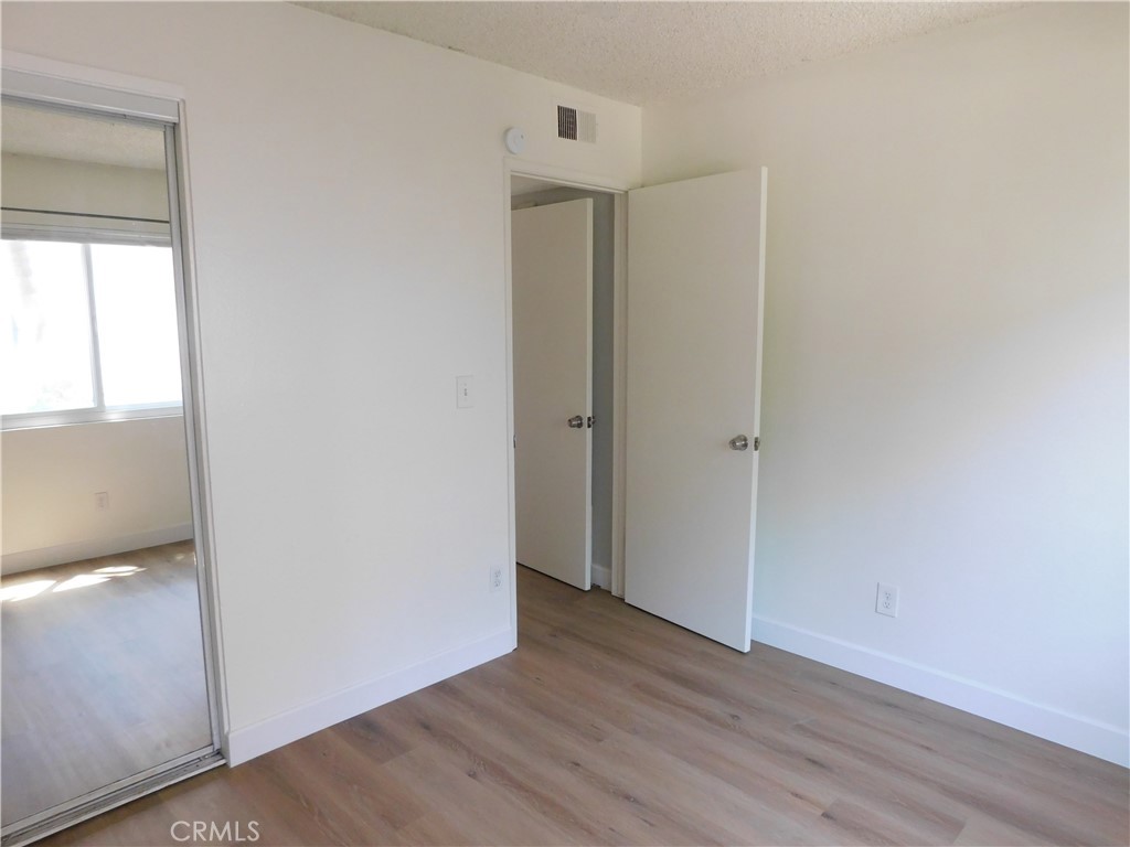 2521 West Sunflower Avenue, Unit R1 Santa Ana, CA 92704 - Photo 15 of 38 Secondary Bedroom