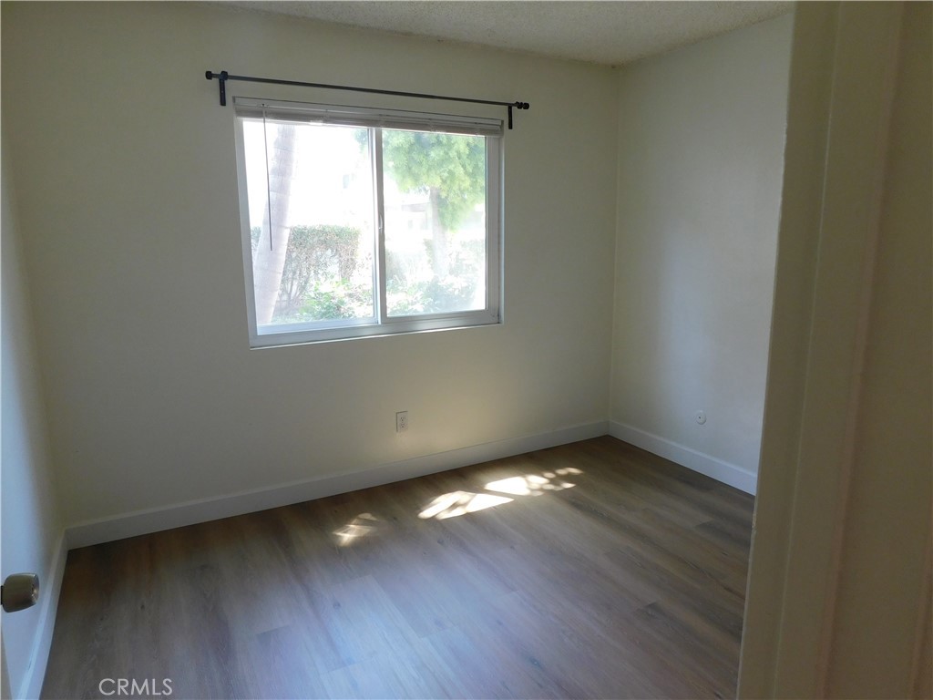 2521 West Sunflower Avenue, Unit R1 Santa Ana, CA 92704 - Photo 16 of 38 Secondary Bedroom