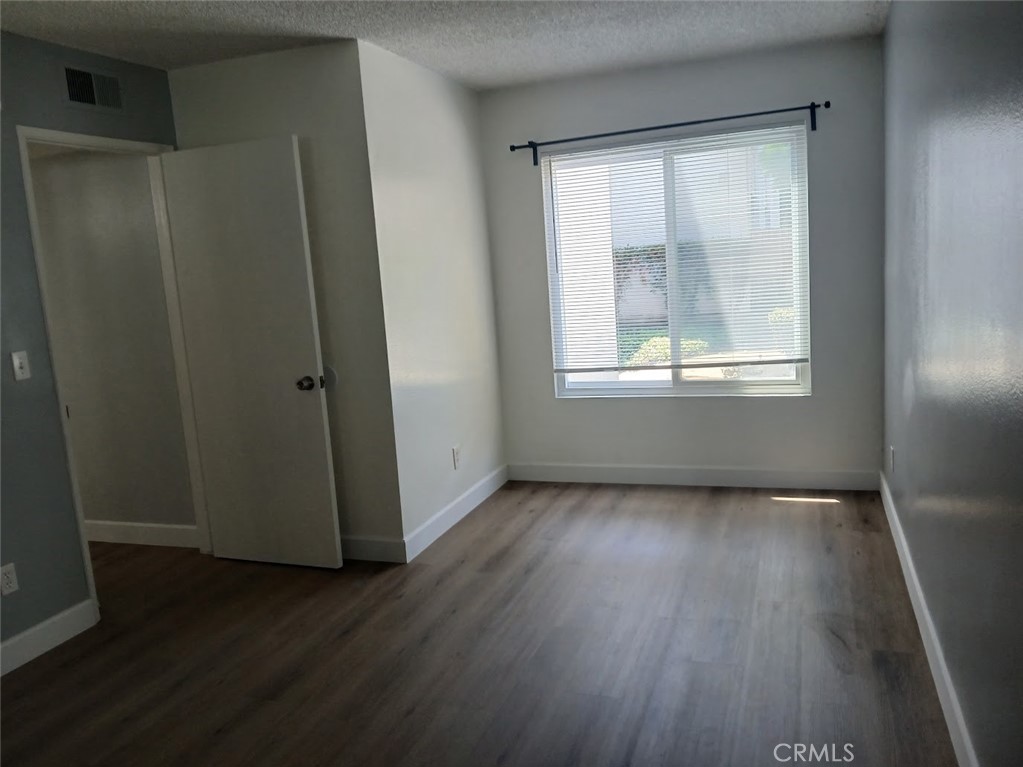 2521 West Sunflower Avenue, Unit R1 Santa Ana, CA 92704 - Photo 17 of 38 Spacious Primary Bedroom