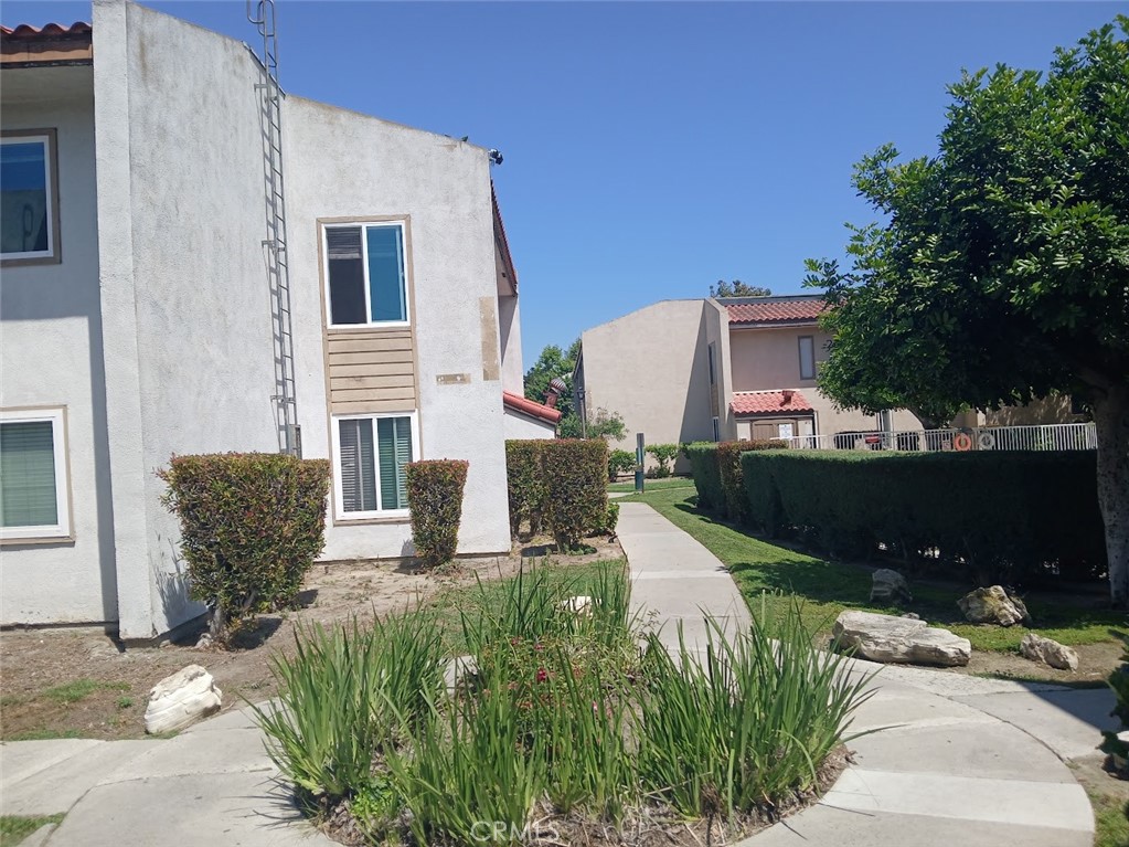 2521 West Sunflower Avenue, Unit R1 Santa Ana, CA 92704 - Photo 24 of 38 R Building by secondary pool, R1 to the left