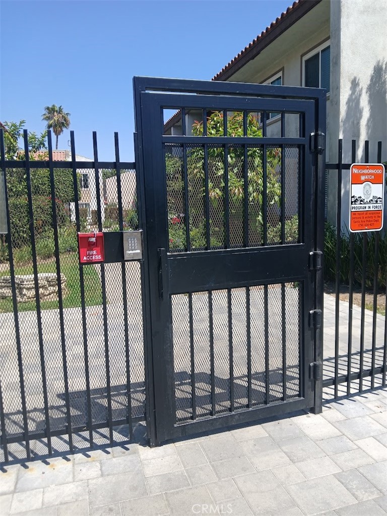 2521 West Sunflower Avenue, Unit R1 Santa Ana, CA 92704 - Photo 28 of 38 Man gate close to R Building