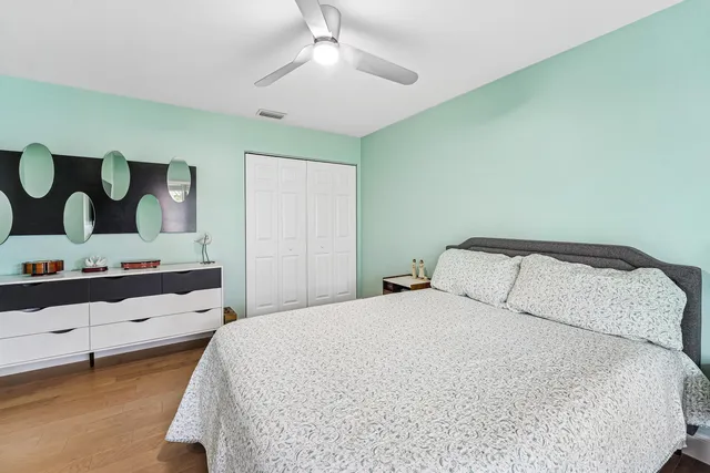 a view of a patio with table and chairs