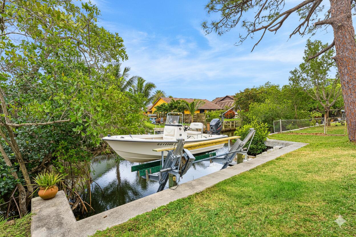 709 Warren Drive Jupiter, FL 33458 - Photo 40 of 57 virtually staged boat