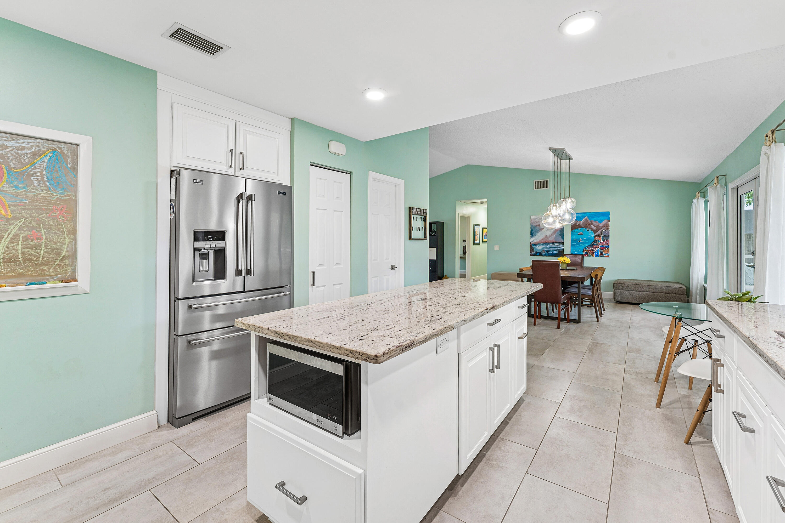 709 Warren Drive Jupiter, FL 33458 - Photo 8 of 57 008-709WarrenDrive-Jupiter-FL-33458-FULL