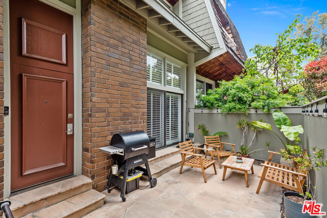 a building outdoor space with patio furniture