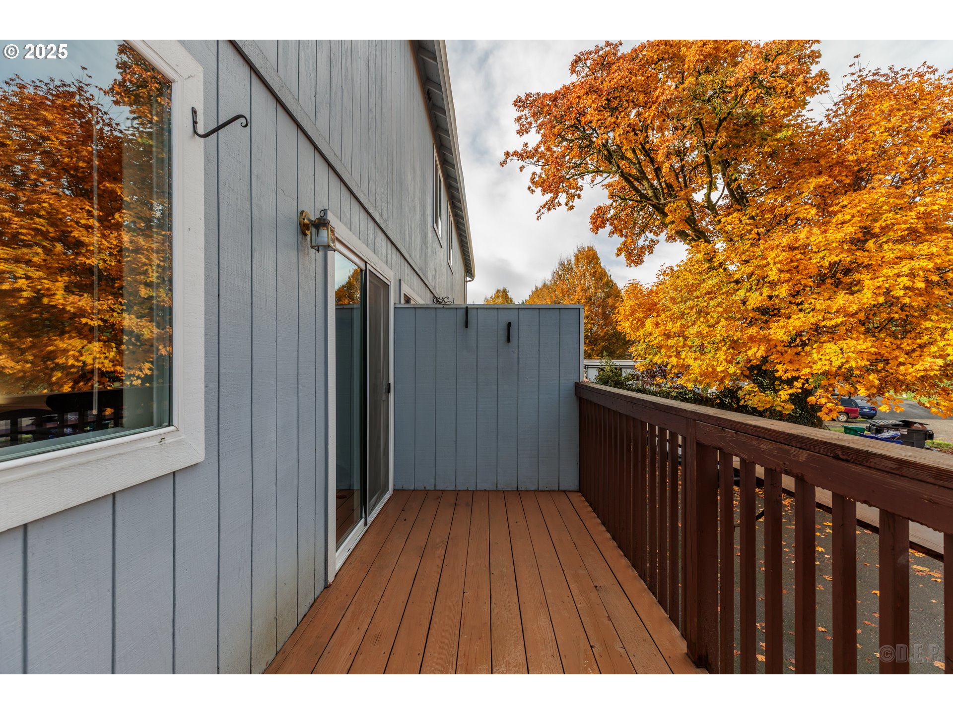 6621 North Columbia Way, Unit 4 Portland, OR 97203 - Photo 14 of 22 a balcony view with wooden floor