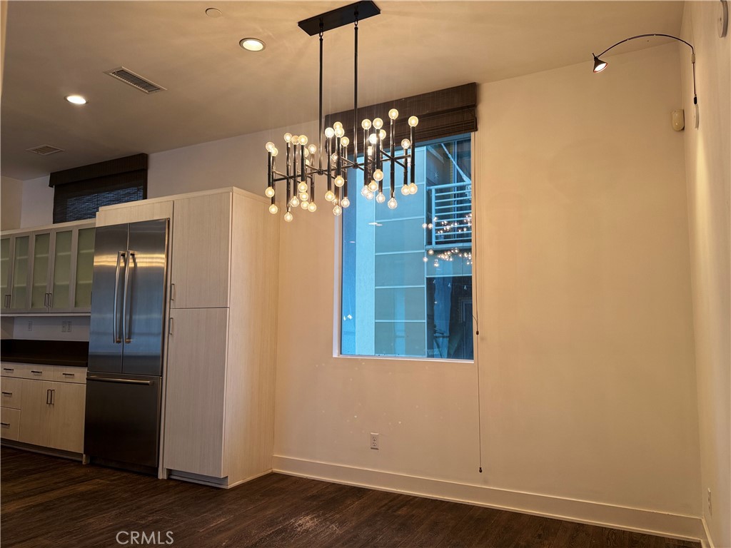 2205 Tom Mix Road Los Angeles, CA 90026 - Photo 5 of 20 a view of a kitchen with granite countertop stainless steel appliances and a chandelier