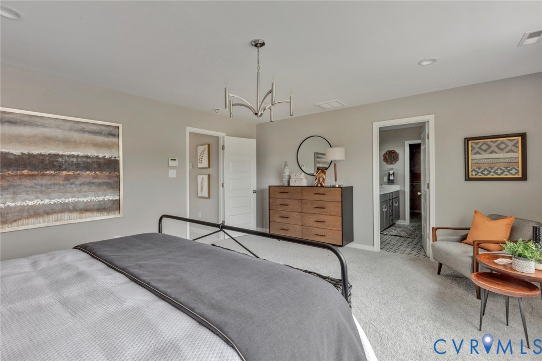 925 Charlemagne Road Midlothian, VA 23114 - Photo 22 of 43 a bedroom with a bed mirror and window