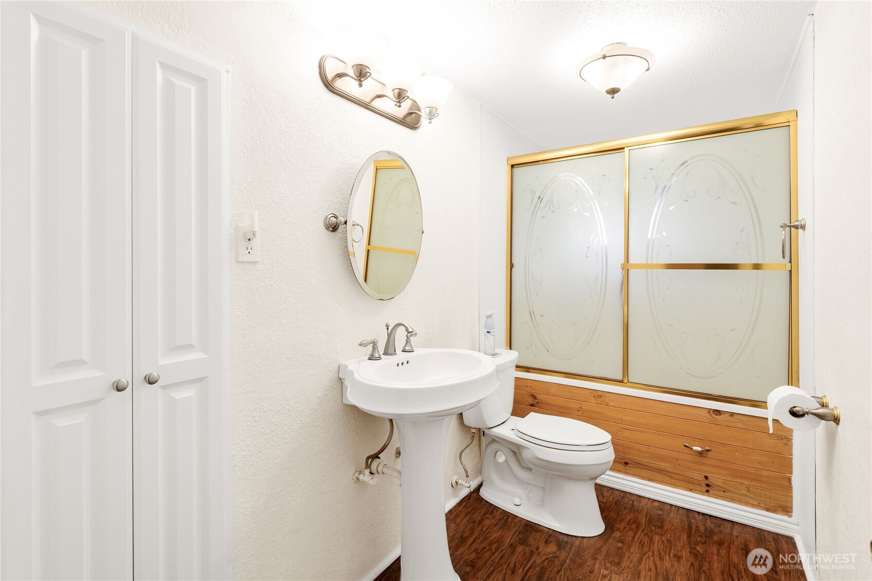 504 South 6th Street McCleary, WA 98557 - Photo 17 of 40 a bathroom with a sink toilet and shower