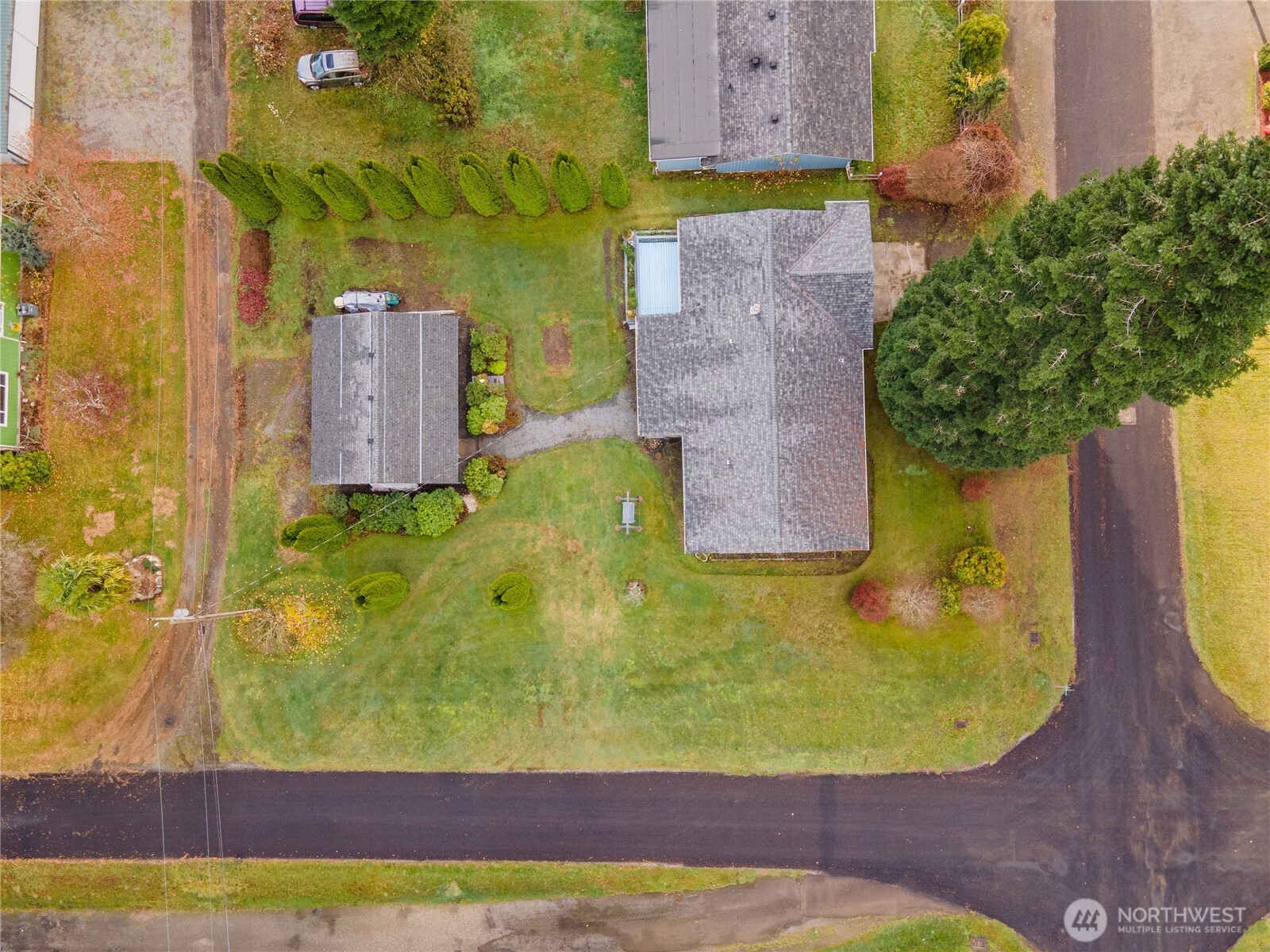 504 South 6th Street McCleary, WA 98557 - Photo 34 of 40 an aerial view of a house with a swimming pool
