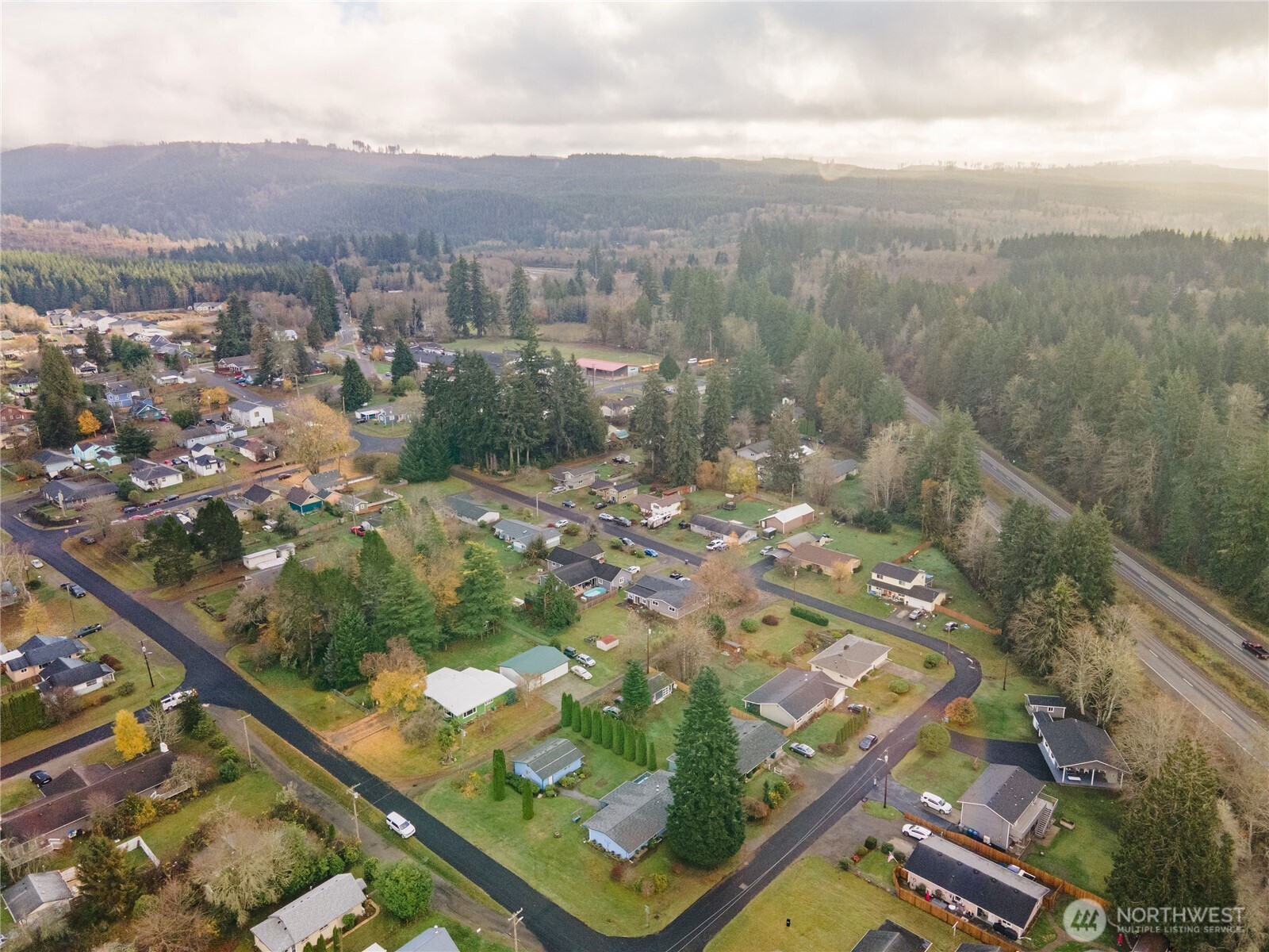 504 South 6th Street McCleary, WA 98557 - Photo 40 of 40 an aerial view of residential houses with outdoor space