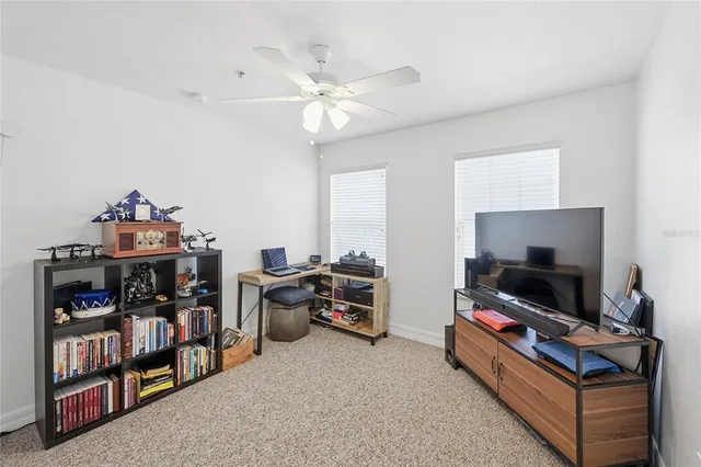 a view of a workspace with furniture