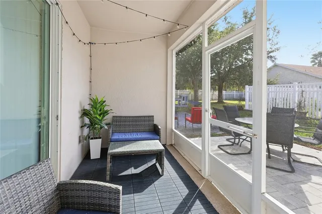 a view of a swimming pool and lounge chair