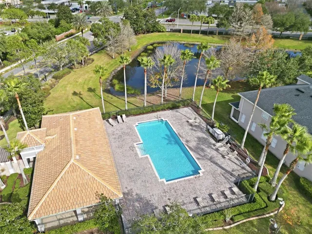 a view of a swimming pool and outdoor space