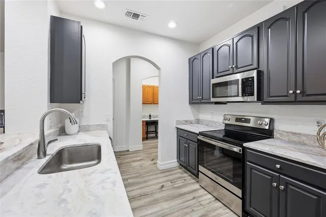 a view of cabinets with wooden floor and cabinet