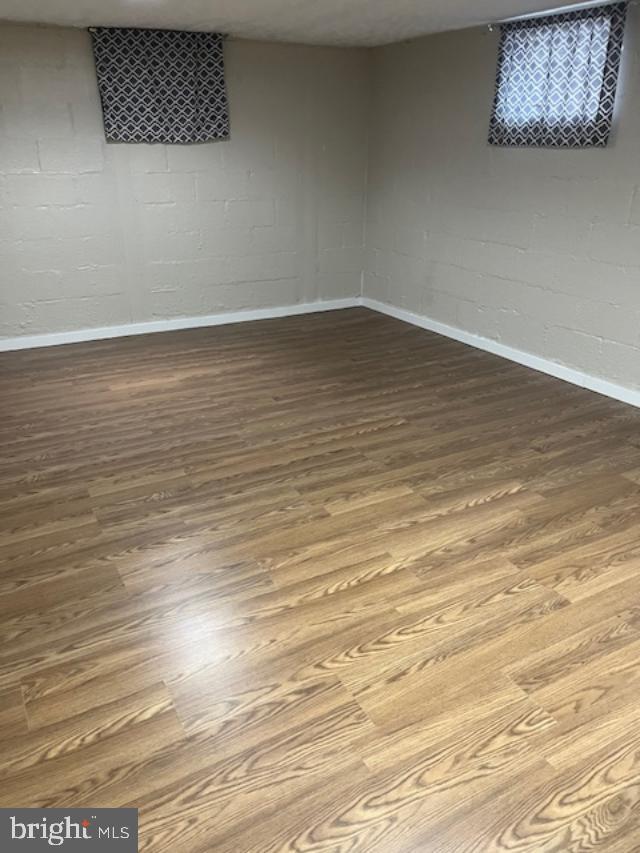 7032 Token Valley Road Manassas, VA 20112 - Photo 13 of 25 en empty room with wooden floor
