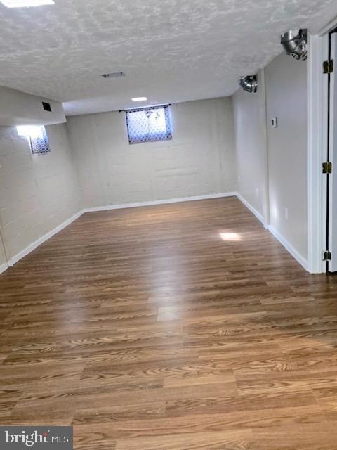 7032 Token Valley Road Manassas, VA 20112 - Photo 23 of 25 wooden floor in an empty room