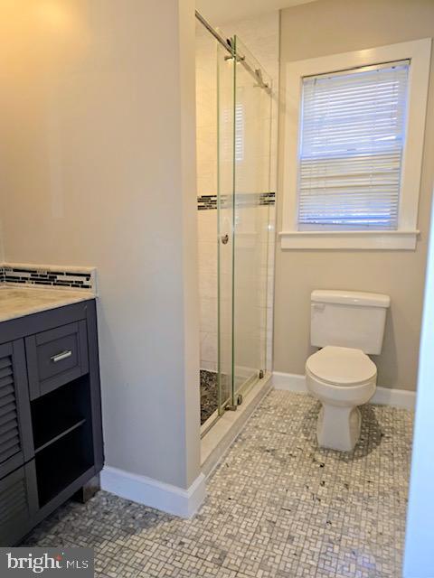 7032 Token Valley Road Manassas, VA 20112 - Photo 25 of 25 a bathroom with a toilet and a shower