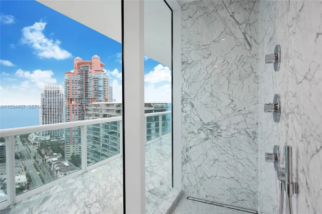 a view of balcony with furniture