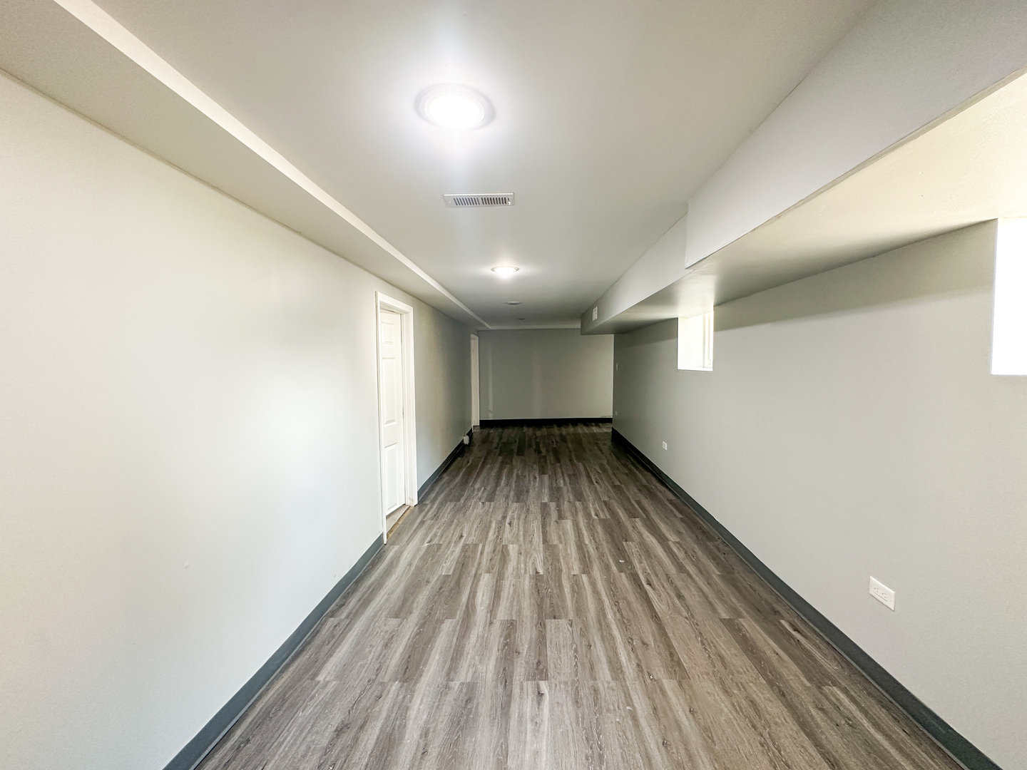 646 Frances Street Phoenix, IL 60426 - Photo 20 of 30 a view of empty room with wooden floor