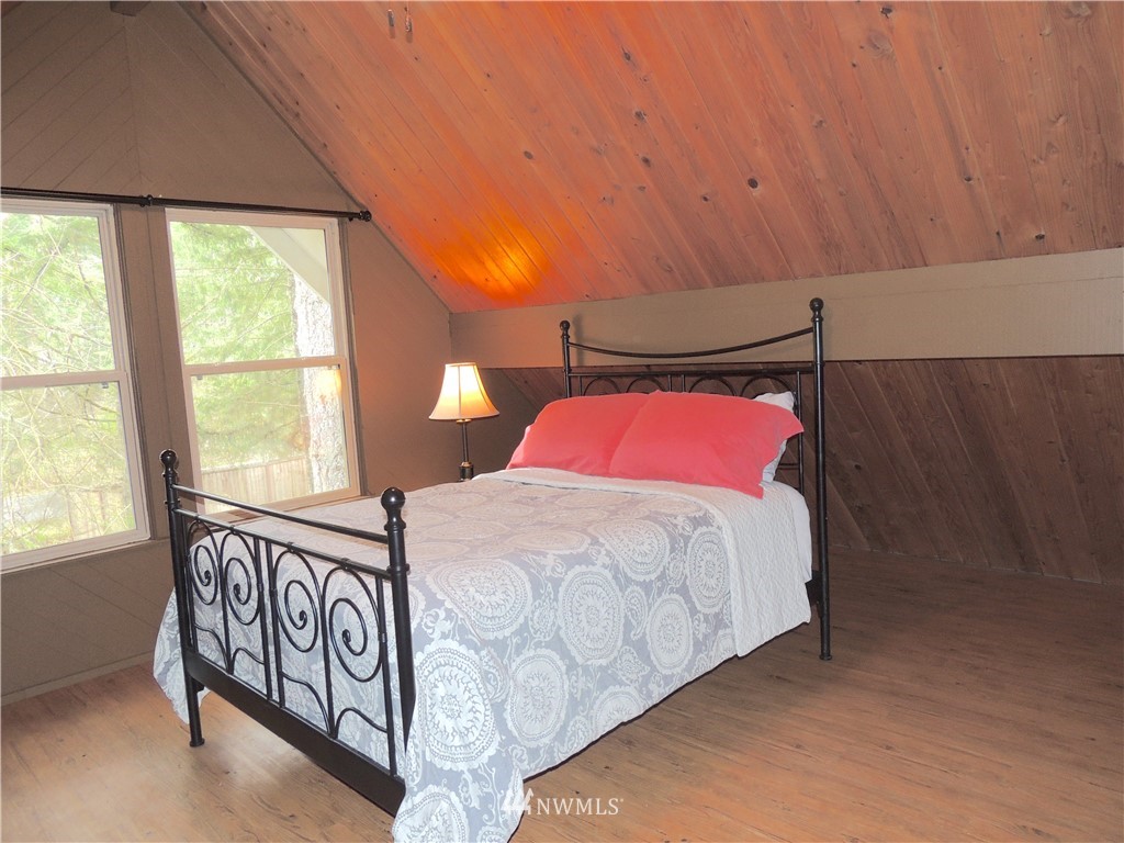 17609 Loop Lane Southeast Yelm, WA 98597 - Photo 11 of 23 a bedroom with a bed and window
