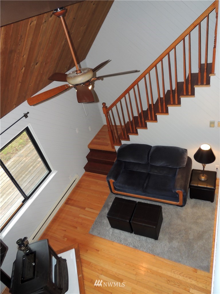17609 Loop Lane Southeast Yelm, WA 98597 - Photo 17 of 23 a living room with furniture
