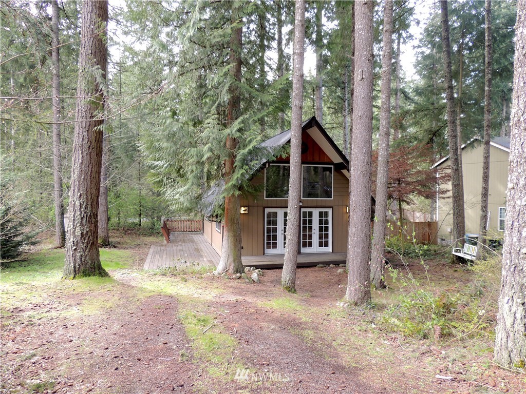 17609 Loop Lane Southeast Yelm, WA 98597 - Photo 19 of 23 a view of a house with a yard