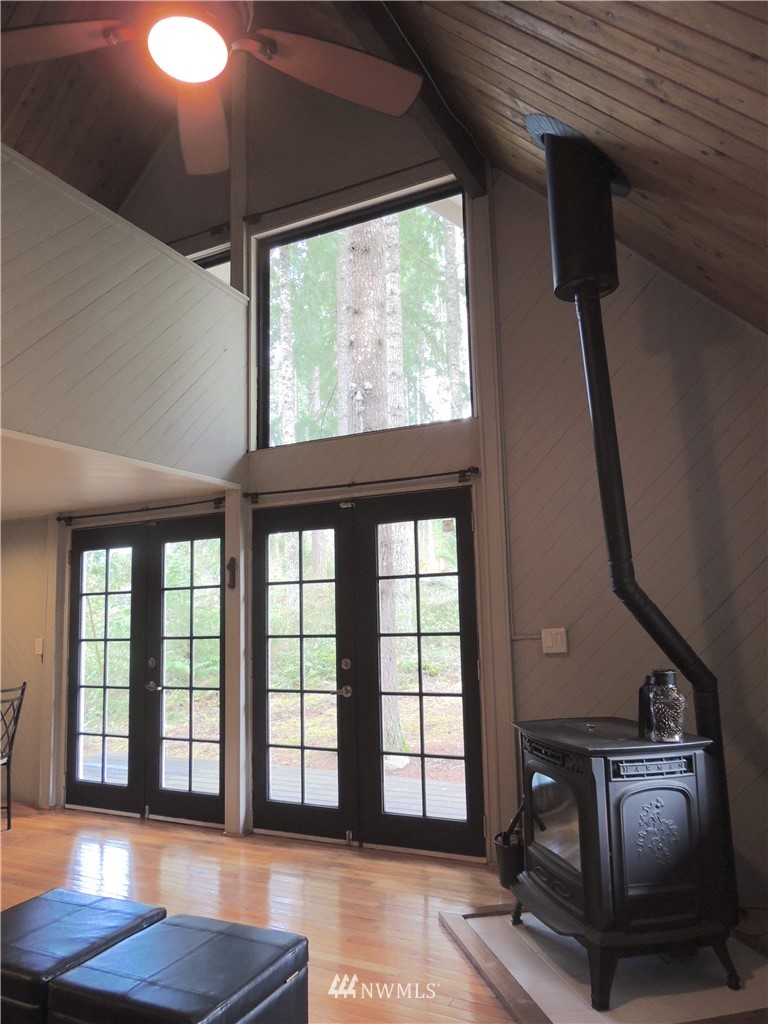 17609 Loop Lane Southeast Yelm, WA 98597 - Photo 5 of 23 a view of a room with wooden floor and staircase