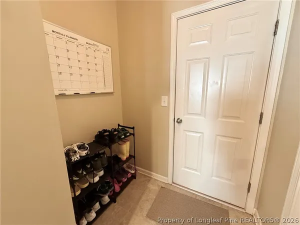 a view of livingroom with furniture and entryway