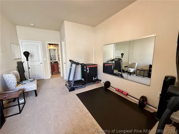 an entryway with a rug