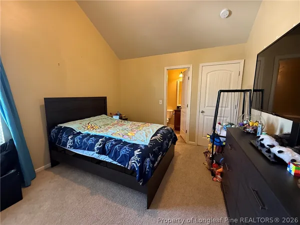 a view of a livingroom with furniture and a livingroom