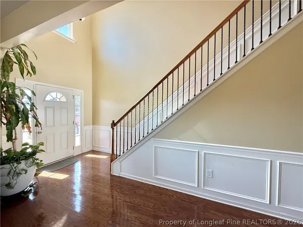 a view of entryway with wooden floor
