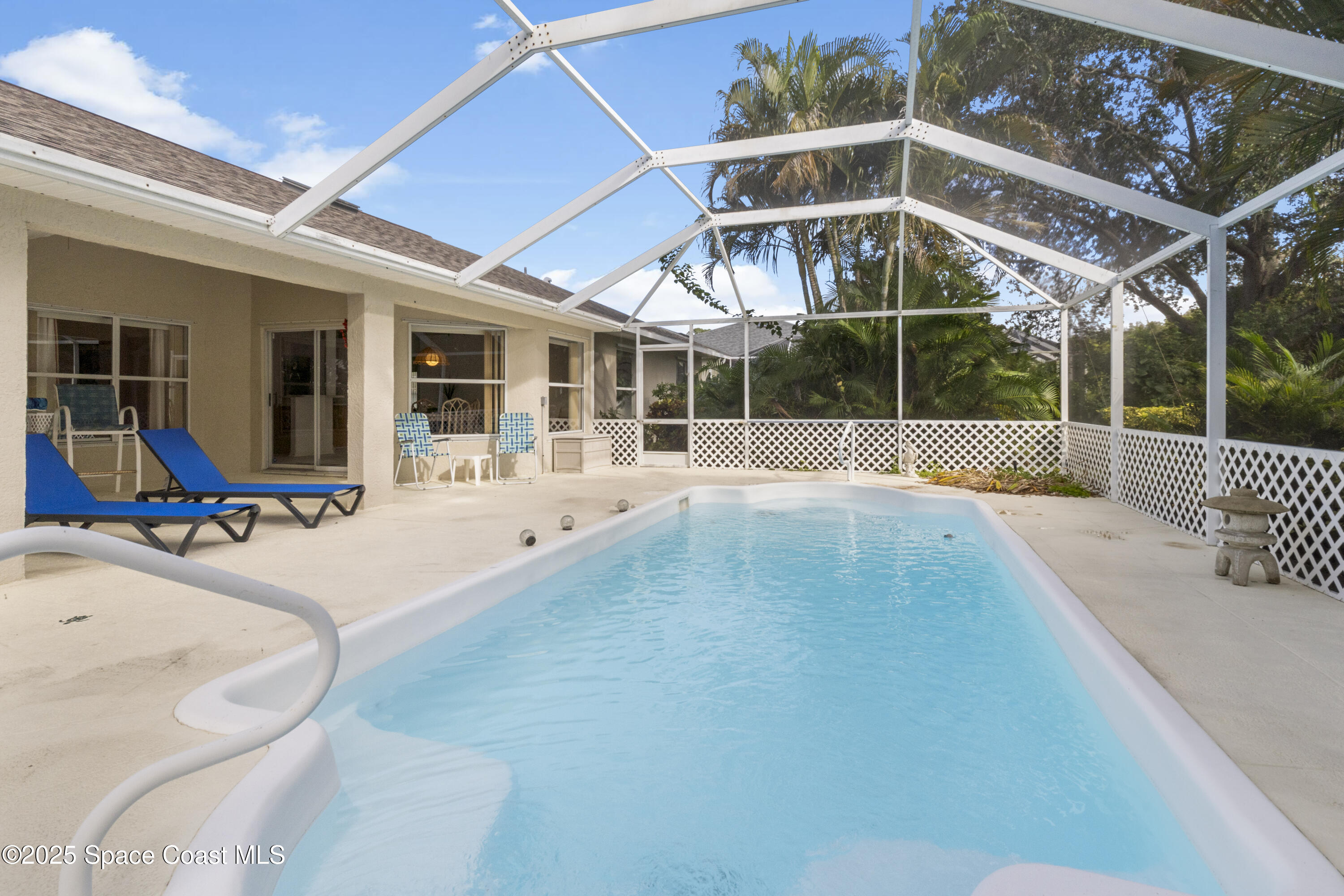 5155 3rd Manor Vero Beach, FL 32968 - Photo 25 of 29 a view of a house with backyard and porch