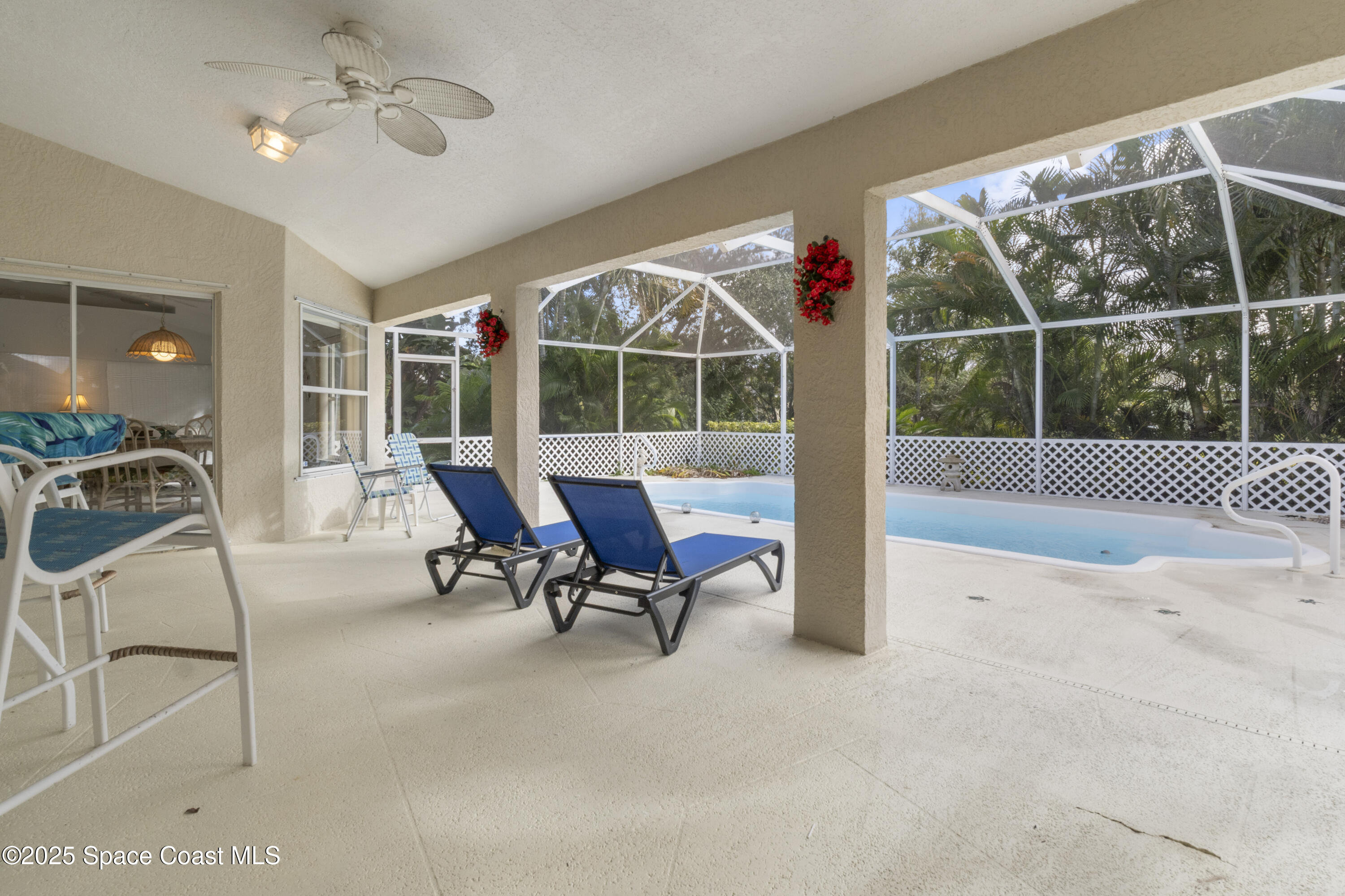 5155 3rd Manor Vero Beach, FL 32968 - Photo 27 of 29 a living room with furniture and a large window