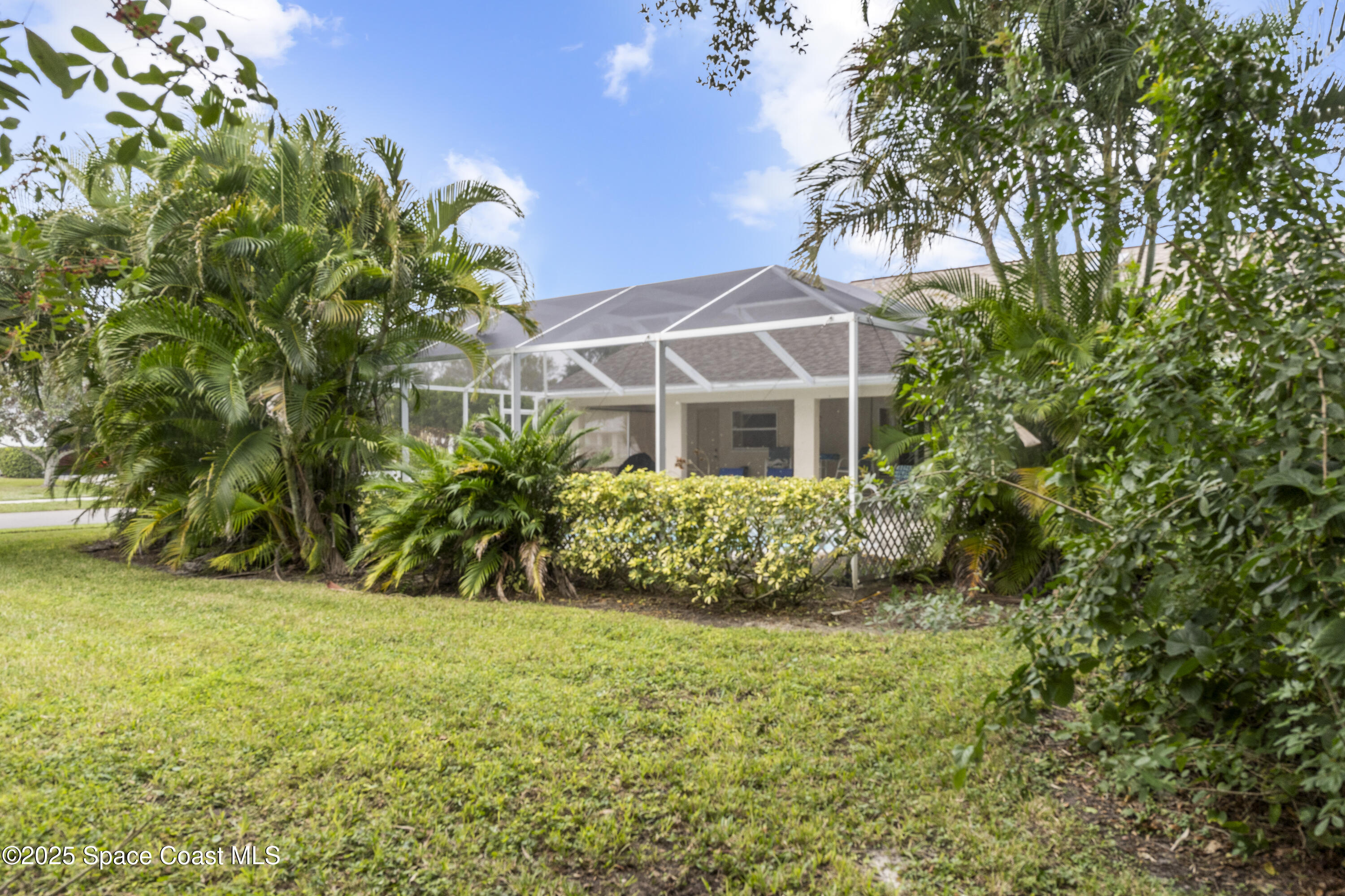5155 3rd Manor Vero Beach, FL 32968 - Photo 29 of 29 a front view of a house with a yard