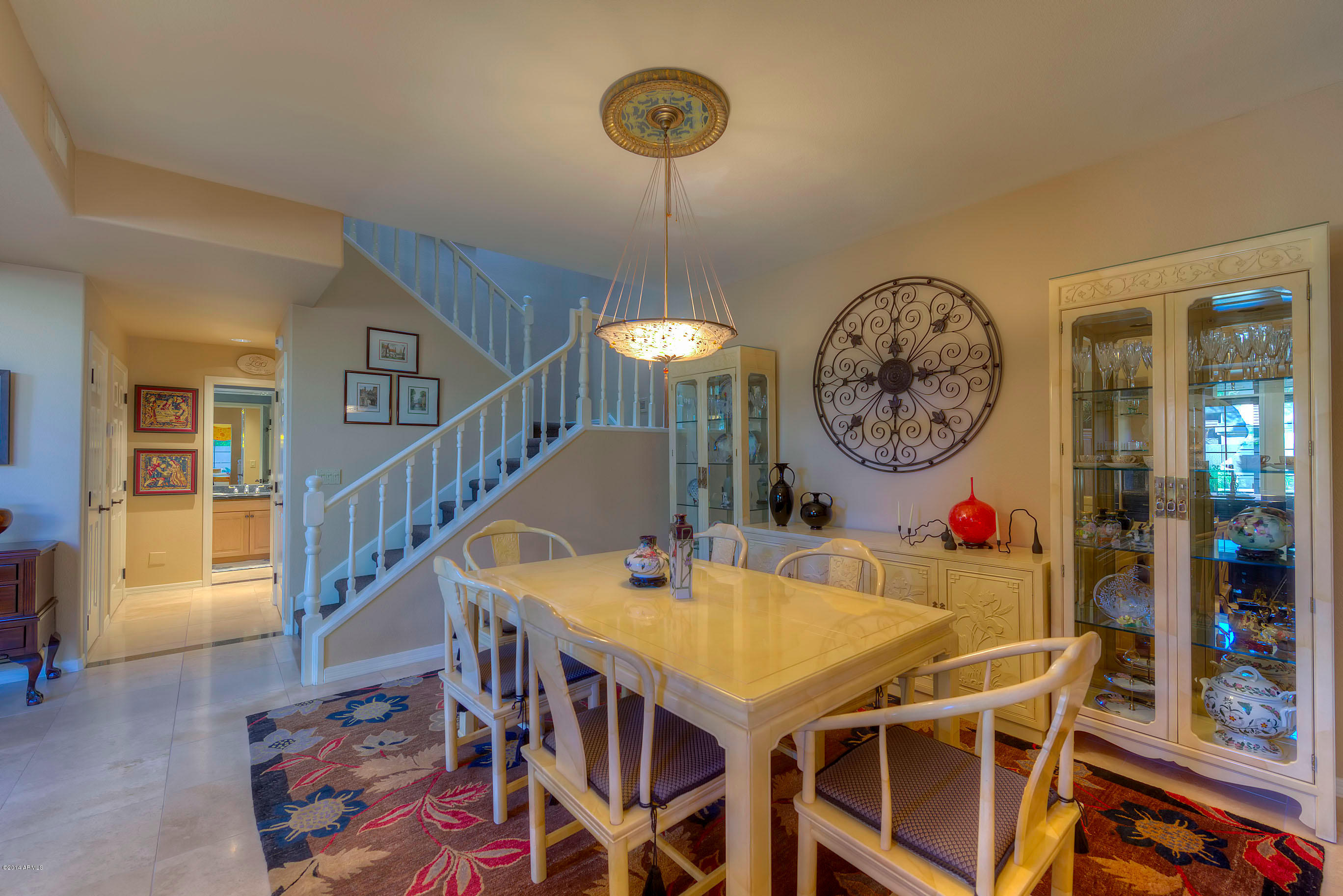 7525 East Gainey Ranch Road, Unit 165 Scottsdale, AZ 85258 - Photo 7 of 22 007_Dining Room and Stairway