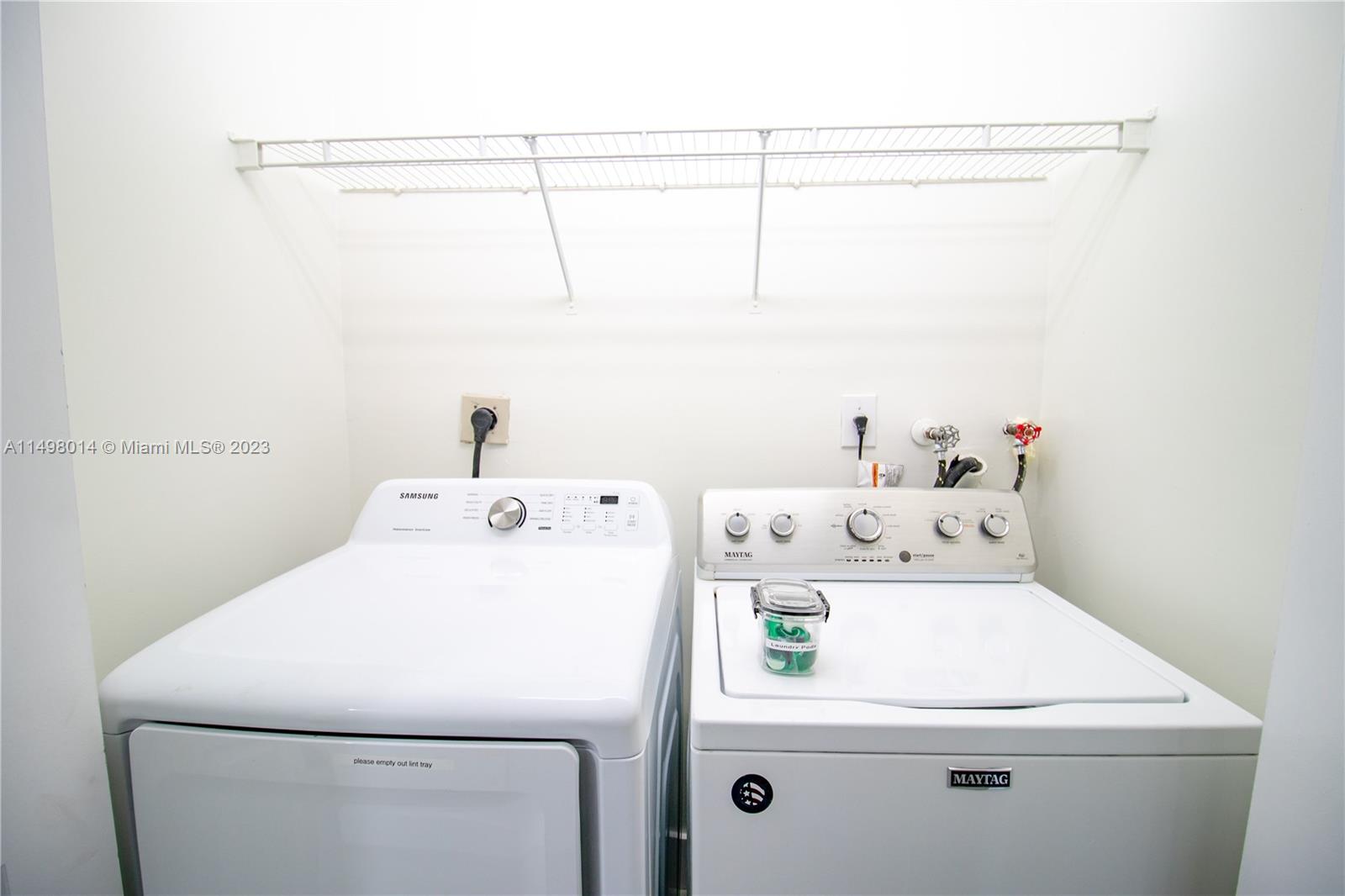 18706 Southwest 100th Avenue, Unit 18706 Cutler Bay, FL 33157 - Photo 19 of 20 a utility room with dryer and washer