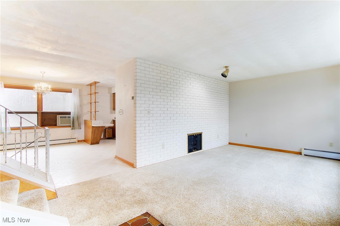 5334 Ridge Avenue Southeast Canton, OH 44707 - Photo 5 of 47 Huge fireplace wall. A wood beam mantle would look groovy there!!