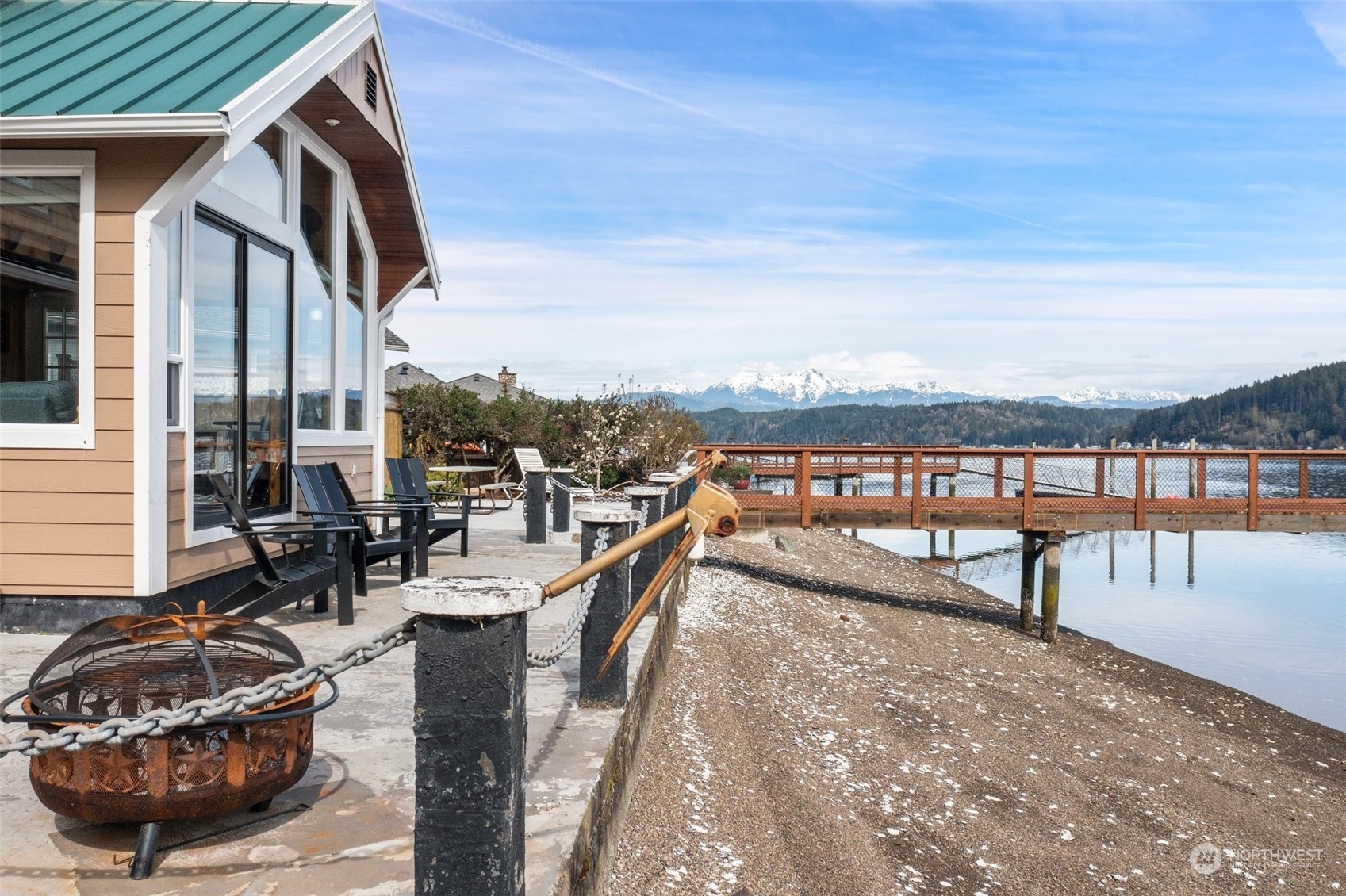 8371 Highway 106 Union, WA 98592 - Photo 2 of 29 a view of a swimming pool with a lounge chair