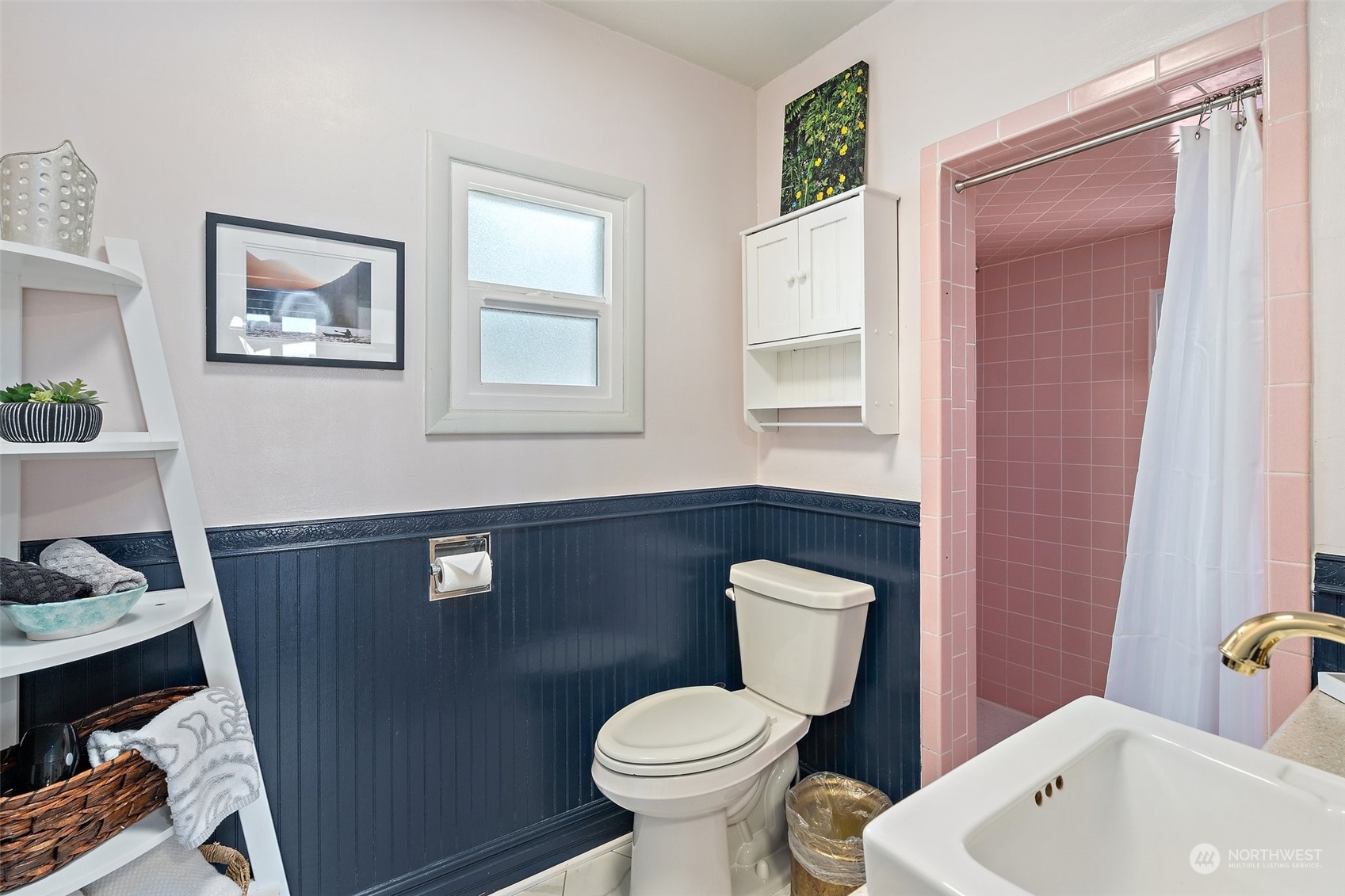 8371 Highway 106 Union, WA 98592 - Photo 8 of 29 a bathroom with a toilet sink and mirror