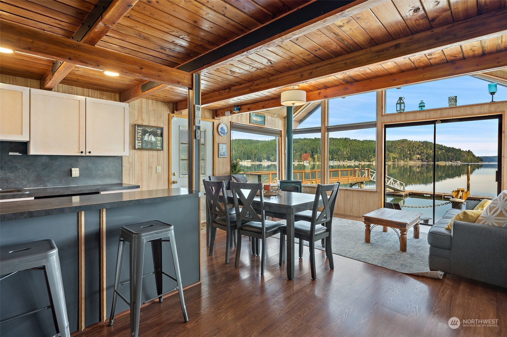 8371 Highway 106 Union, WA 98592 - Photo 9 of 29 a view of a dining room with furniture window and wooden floor