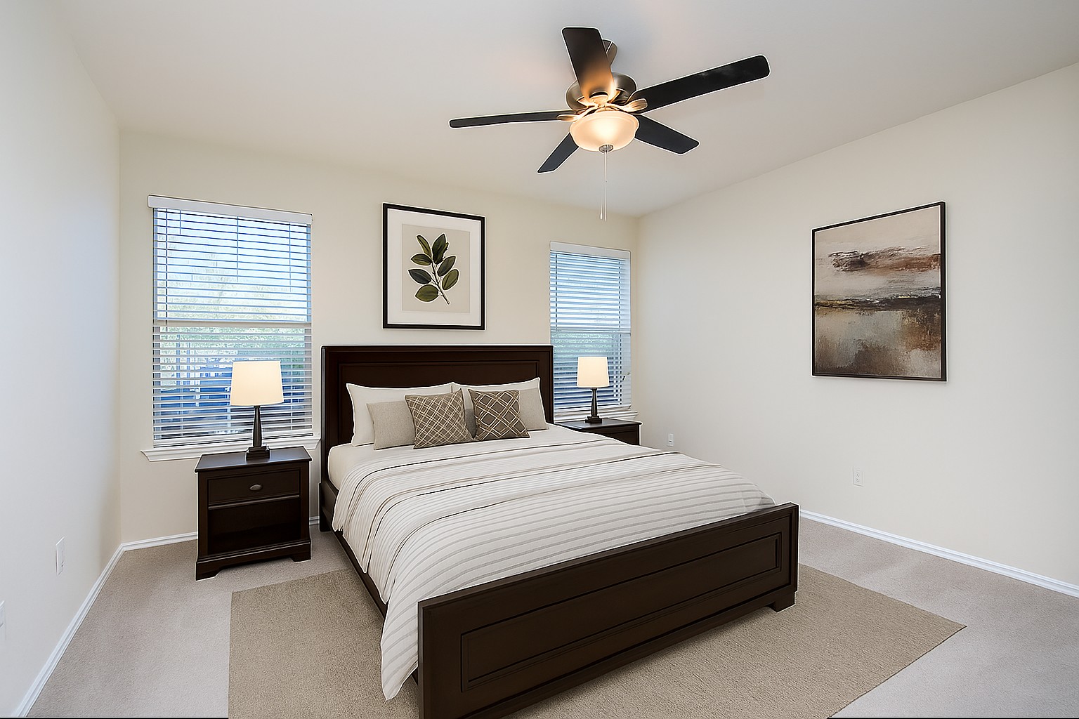 1004 Bluff Meadow Cove Georgetown, TX 78626 - Photo 14 of 26 a large bedroom with a bed and a painting on the wall