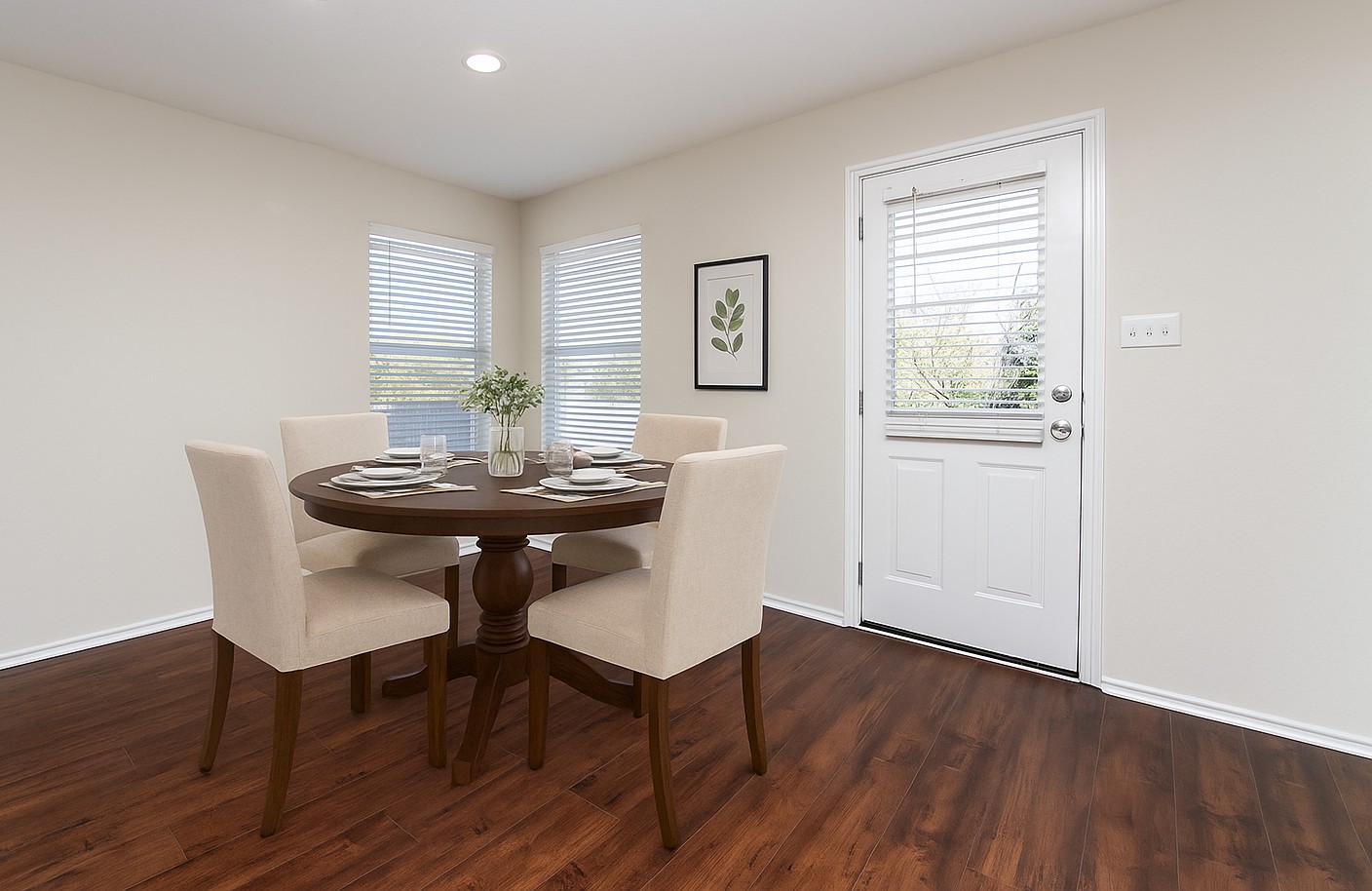 1004 Bluff Meadow Cove Georgetown, TX 78626 - Photo 8 of 26 a view of a dining room with furniture and wooden floor