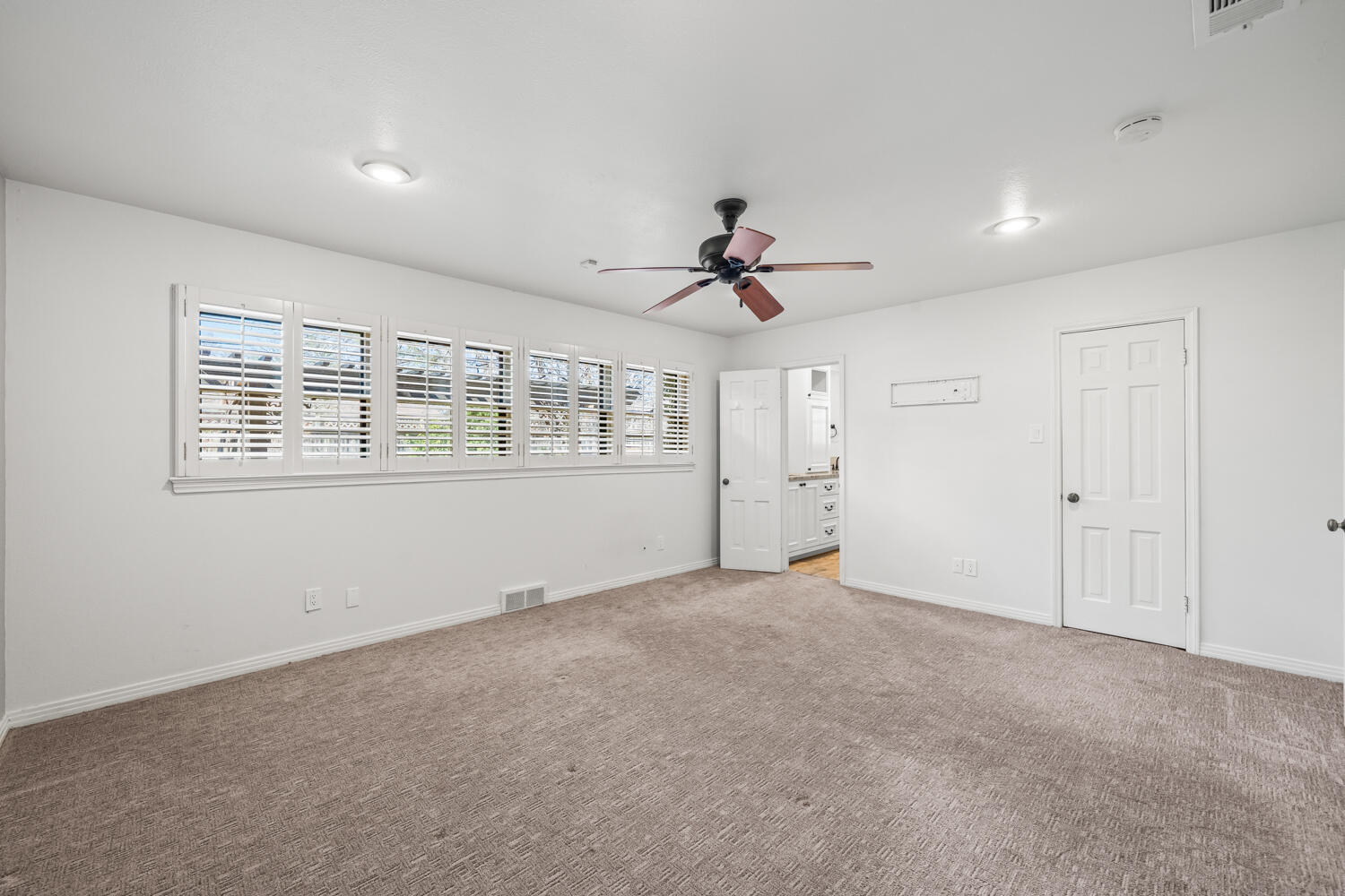 3206 56th Street Lubbock, TX 79413 - Photo 15 of 32 a view of an empty room with a window