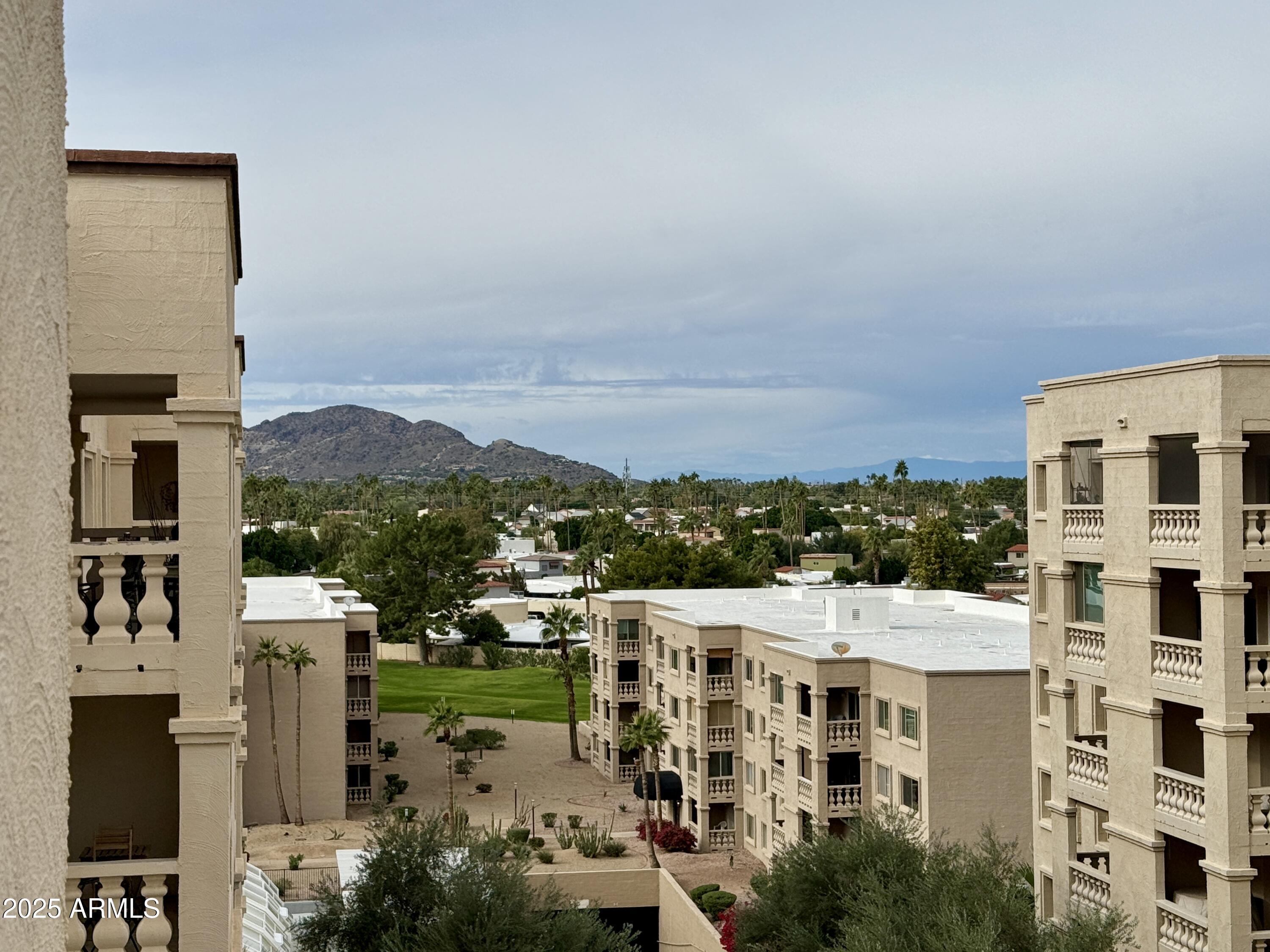 7930 East Camelback Road, Unit 709 Scottsdale, AZ 85251 - Photo 17 of 41 a view of a building with a garden